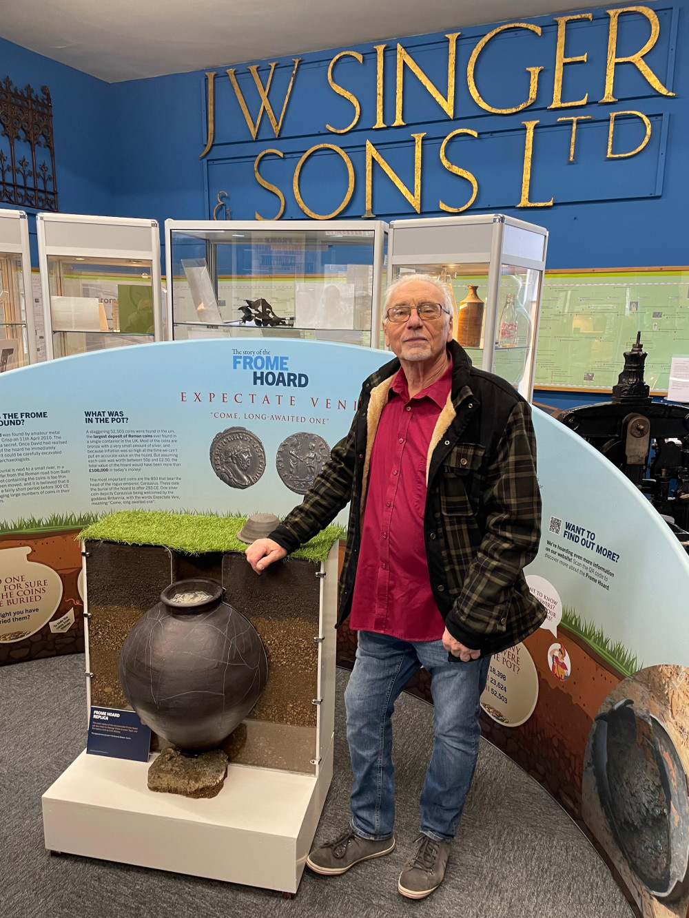 Dave Crisp with the 'Story of the Frome Hoard' display, image Frome Museum