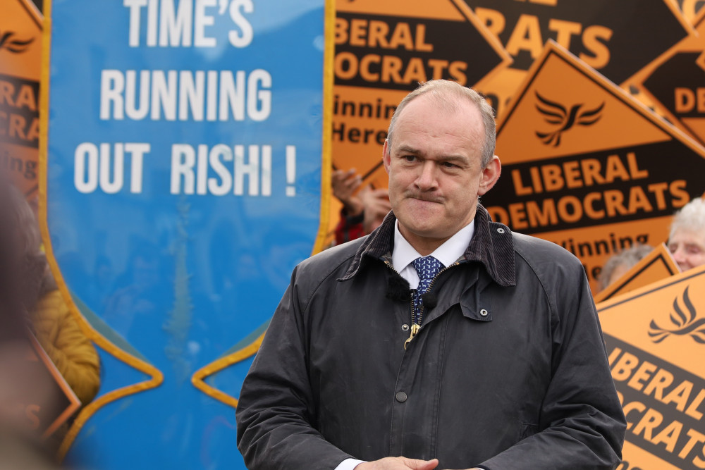 Sir Ed Davey launches Lib Dems local election campaign with giant hourglass stunt in Harpenden. PICTURE: Will Durrant LDRS