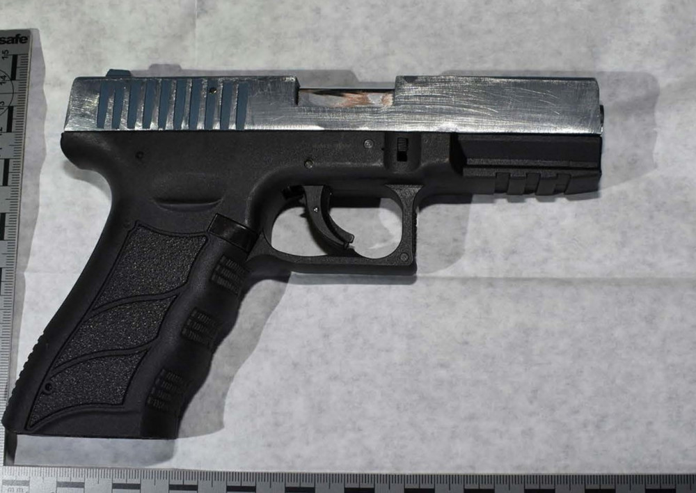 Police seize handgun (pictured) and drugs in Biggleswade dawn raid. CREDIT: Beds Police 