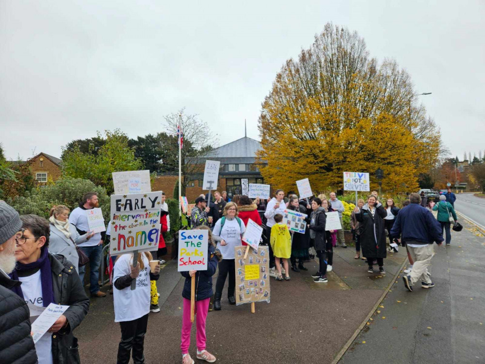 Parents, guardians, teachers, students and members of the community have come together in opposition of the closure of the school. Image credit: Nub News. 