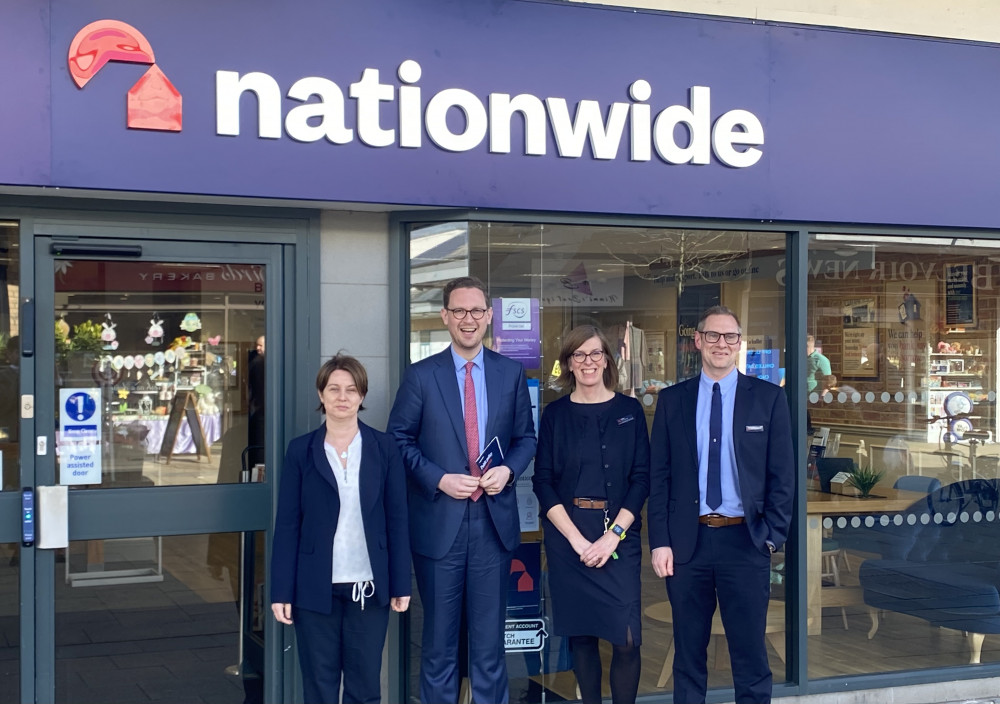 Amanda Hack and Darren Jones with Nationwide's Coalville branch manager Helen Cross. Photo: Coalville Nub News