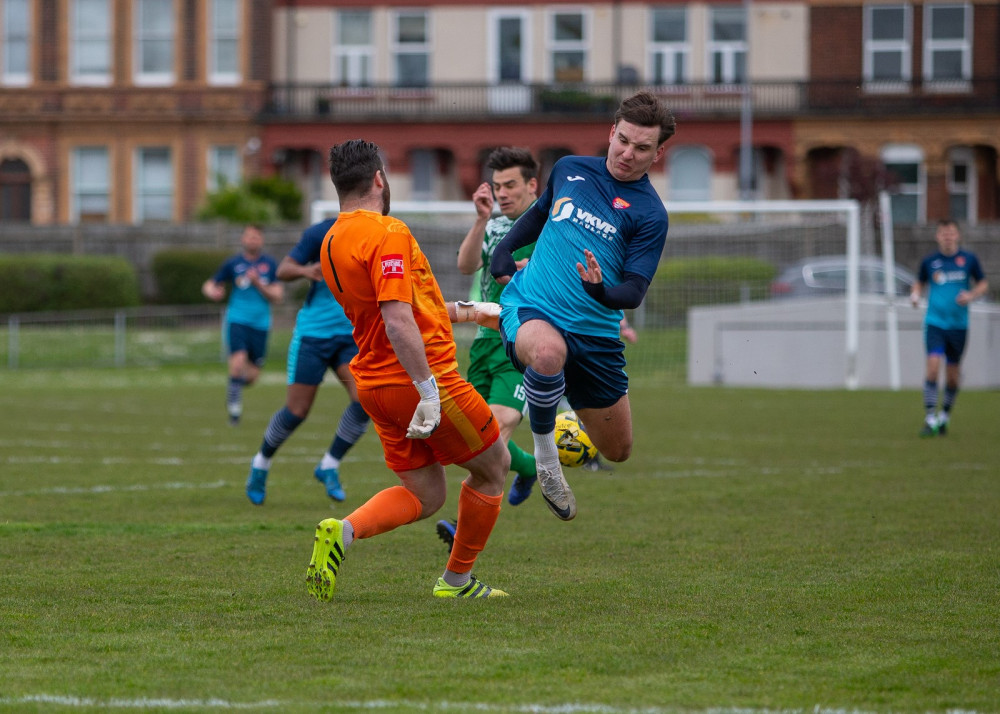 Felixstowe's Callum Harrison challenges for the ball. Picture by Stefan Peck.