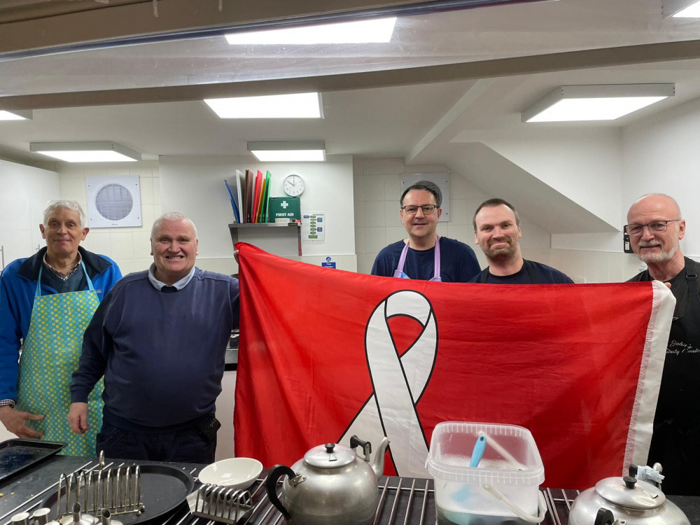 Members of the Breakfast Group fly the flag for White Ribbon with Mr Houldsworth (right). (Photo: Congleton Town Council) 