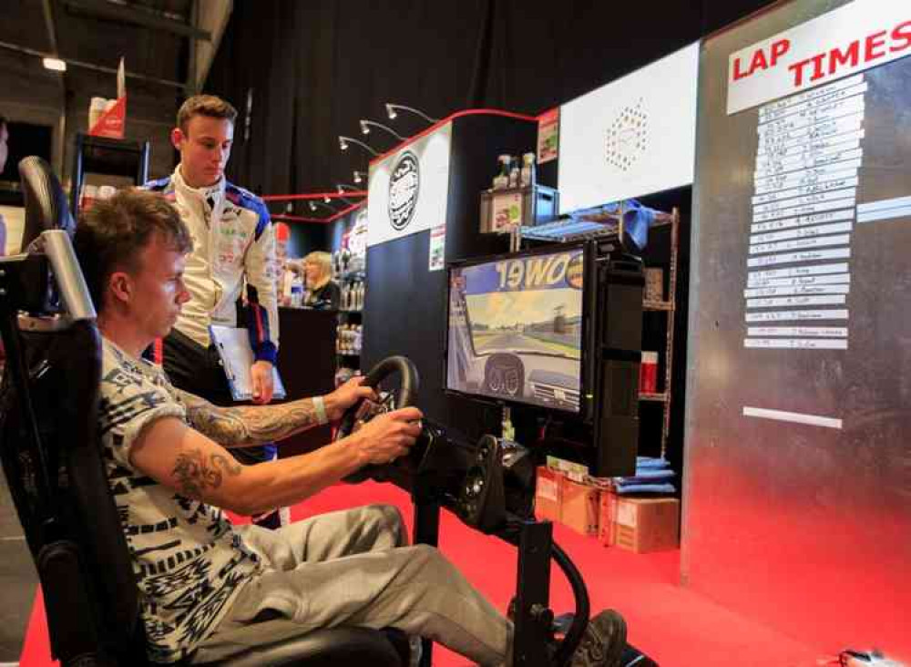 Visitors can have a go on a racing simulator. Photo: Andrew James Media