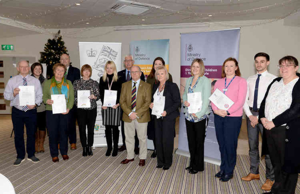 Coun Ian Razzell (centre) with school representatives and guest speakers at Rutland's 2019 Armed Forces Education Conference