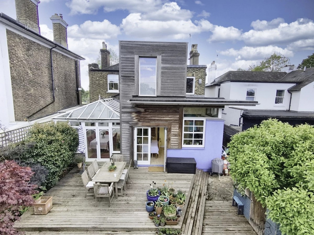 The terraced seating area can be accessed from both the kitchen and the conservatory, perfect for entertaining