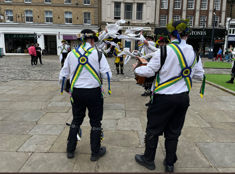 May Day welcomed by Letchworth Morris men dancing in Hitchin Market Place - gallery and video. PICTURE CREDIT: Steve Biggs / Nub News 