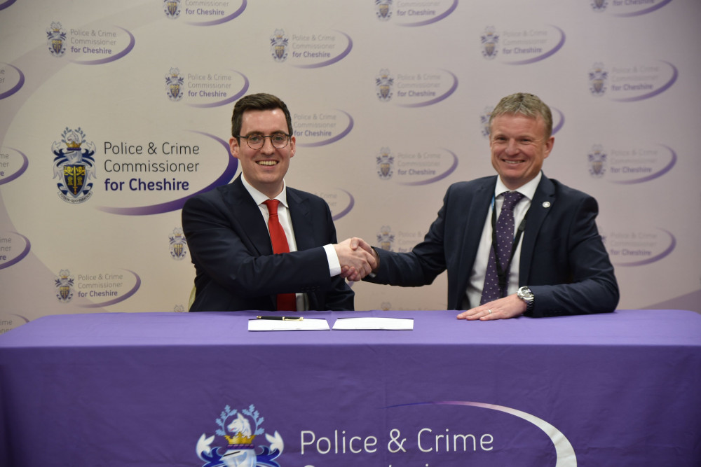 Dan Price shakes the hand of Stephen Young Halton Borough Council Chief Executive following his electoral victory. (Image - Cheshire PCC)