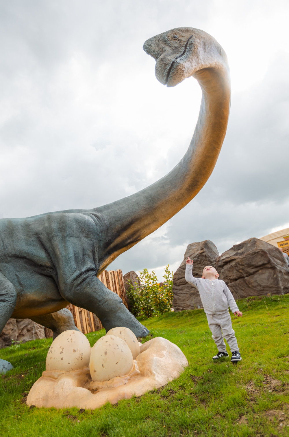 The Dino's tower over the children. (Photo: Michael Chudley)