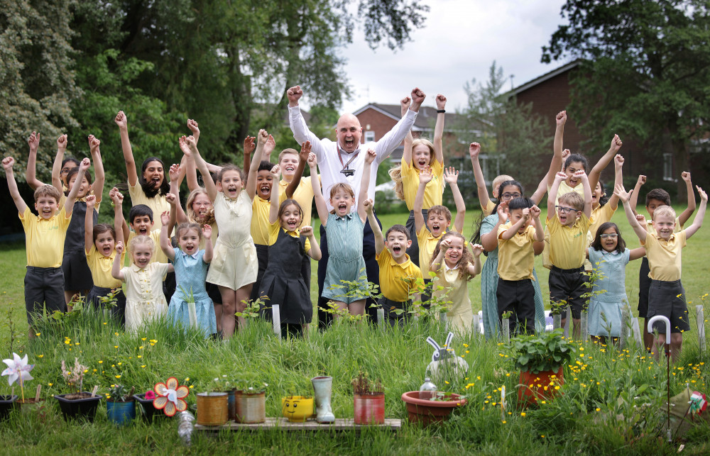 Headteacher Chris Bagnall with pupils at Bradshaw Hall Primary School in Cheadle Hulme, Stockport (Image - Sean Hansford)