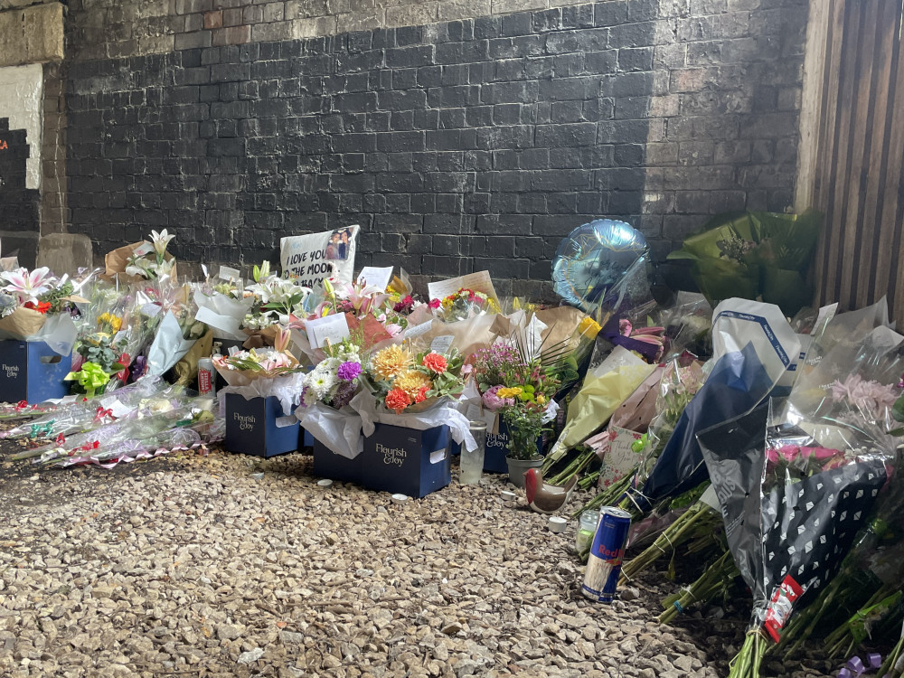 Tributes to Jill Canovan at Heaton Chapel station, where she tragically passed away on Monday 3 June