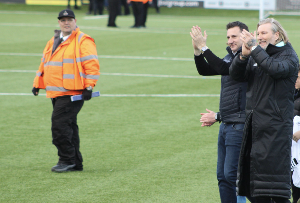 Robbie Savage (centre right) pictured on the Leasing.com Stadium pitch. (Image - Macclesfield Nub News)