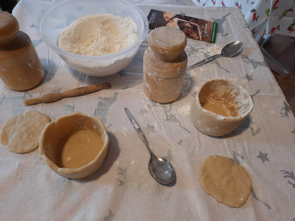 Pork pies are most commonly hand raise using a 'dolly'. Image credit: Nub News. Pork pies are most commonly hand raise using a 'dolly'. Image credit: Nub News.