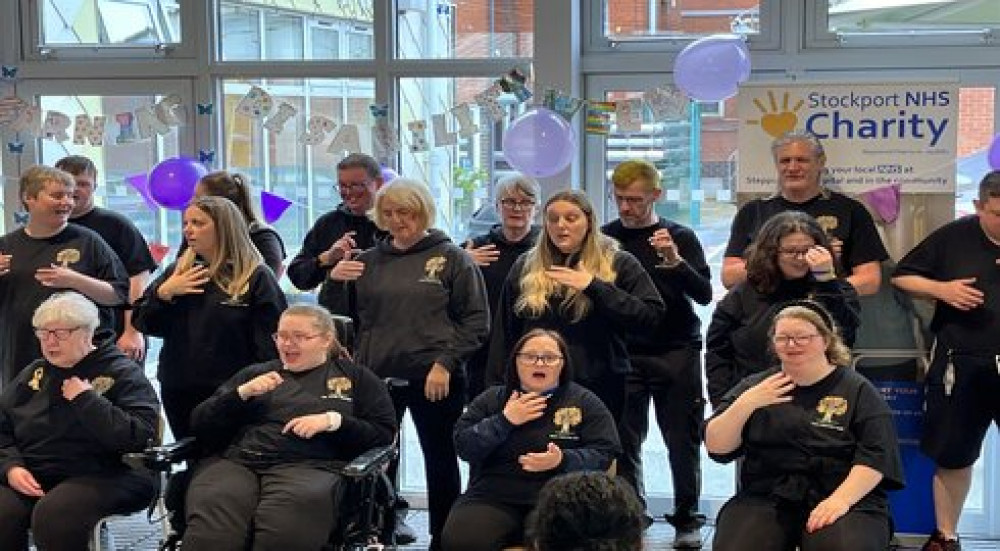 Staff, patients and visitors at Stepping Hill Hospital were treated to a unique choir performance using the Makaton language (Image - Stockport NHSFT)