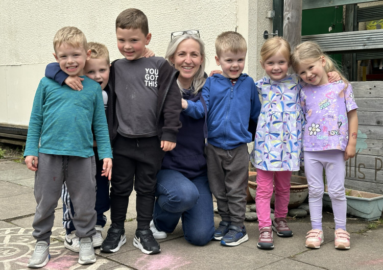Kate Butler with pupils of Greenhills Pre-School, in Tytherington, Macclesfield. 