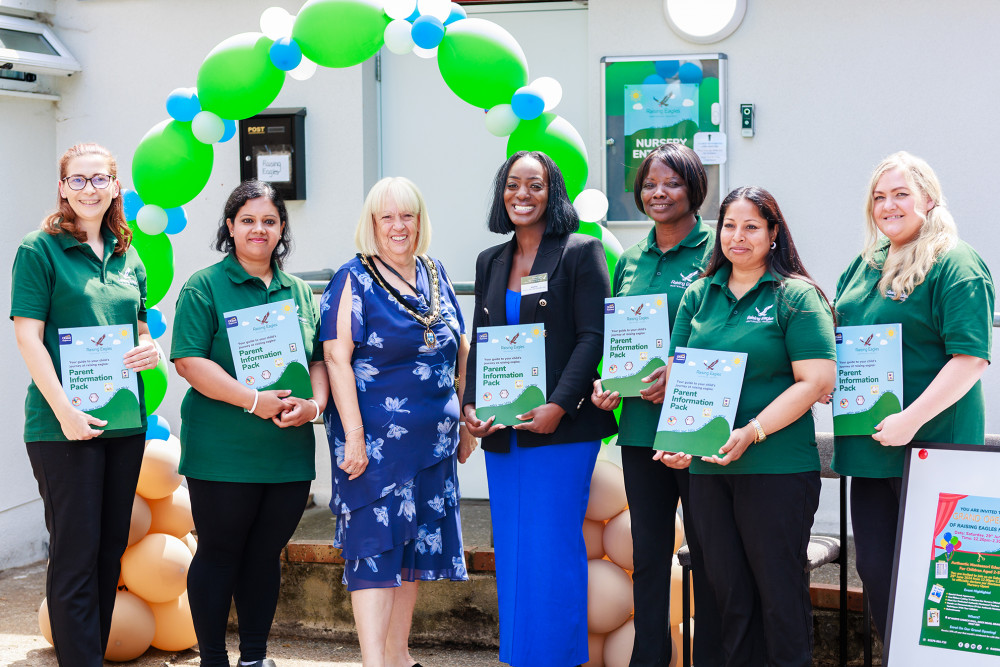 Cllr  Shinnickwith Raising Eagles staff and CEO Beverley Boateng