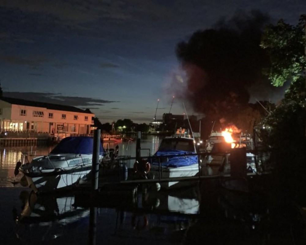 A boat was seen ablaze along Queen's Promenade between Kingston and Surbiton early on Sunday morning, 7 July. (Photo: Shanav Shah)