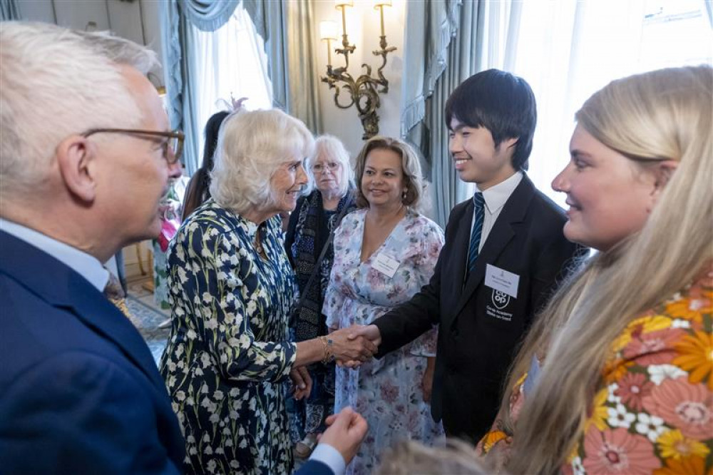 Luo Chen He, 13, from Stoke-on-Trent, was invited to meet The Queen at a special reception in London (National Literacy Trust).