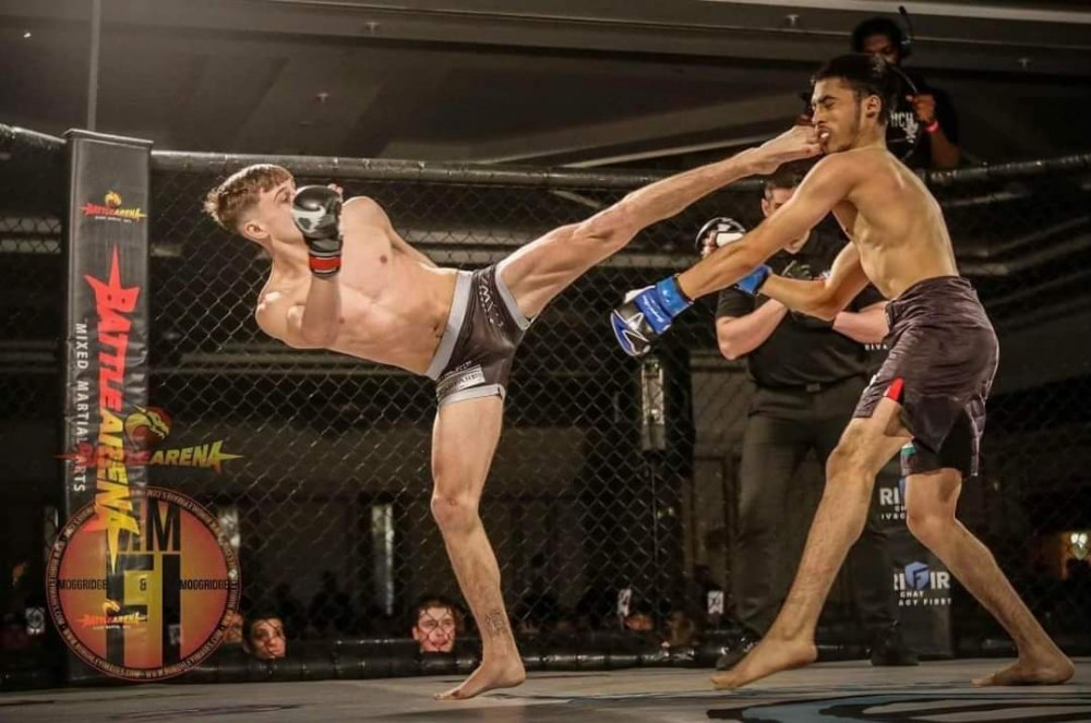 Taylor Perkins (left) is hoping for his second win on an amateur MMA show this month (Battle Arena / Marc Moggridge). Taylor Perkins (left) is hoping for his second win on an amateur MMA show this month (Battle Arena / Marc Moggridge).