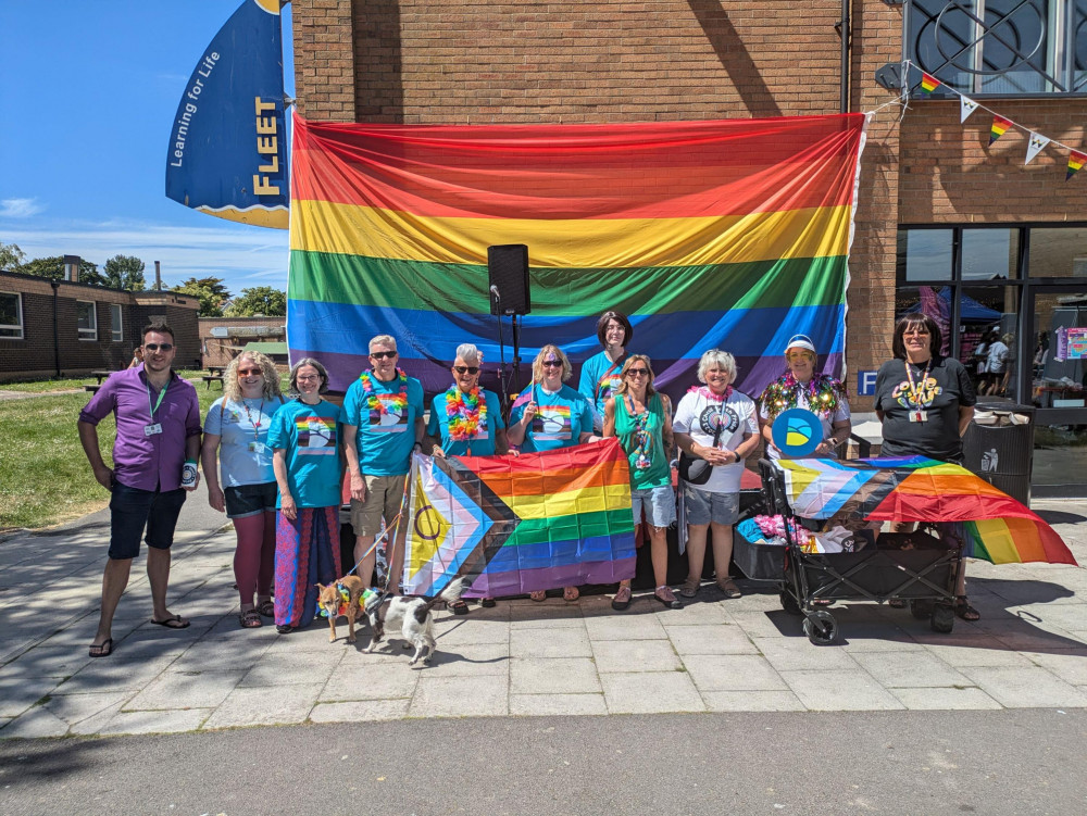 Matt Prosser (Dorset Council's Chief Executive), stands with partners and members of the Chesil Youth Pride working group, including the Dorset Music Hub, The Drop-In (Portland), Space Youth Project, Weymouth College and the Youth Voice team