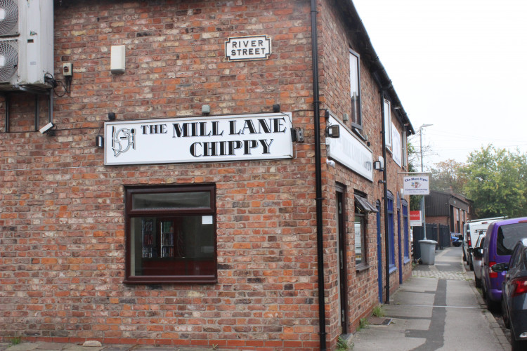 The chip shops are directly next to one another. 