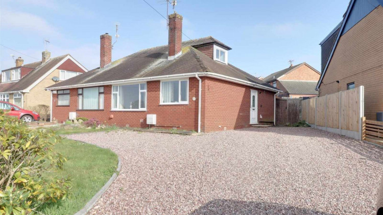 The two-bedroom semi-detached dormer bungalow on Back Lane, Shavington (Stephenson Browne).