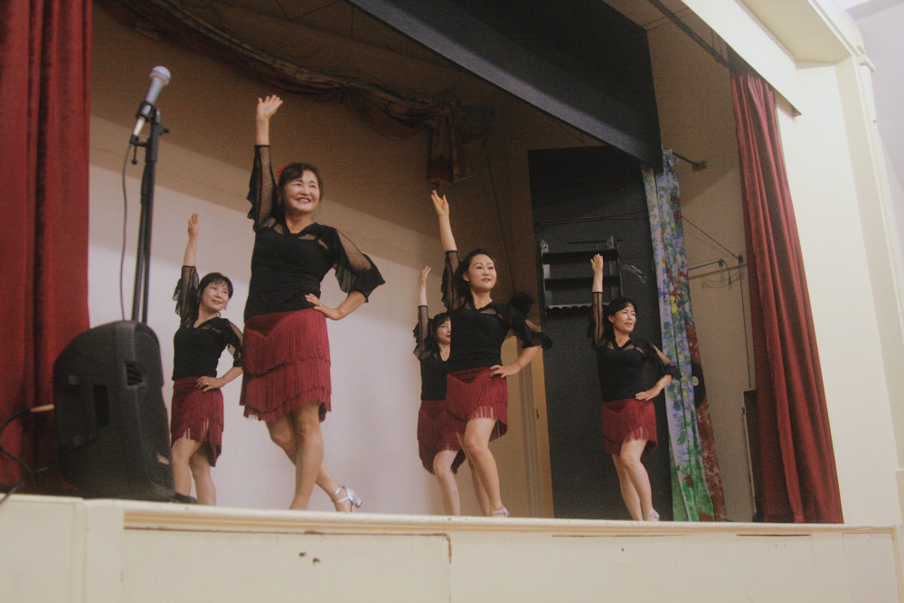 Connect: North Korea uses activities like their dance group – founded by one of the country’s ex-state gymnasts – to help integrate new refugees arriving in the area. (Photo: The National Lottery Community Fund)