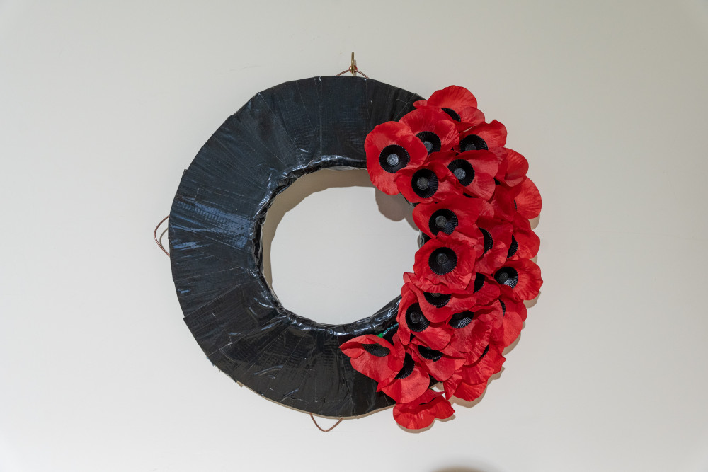 A part-made Remembrance wreath on display at The Poppy Factory (credit: The Poppy Factory).