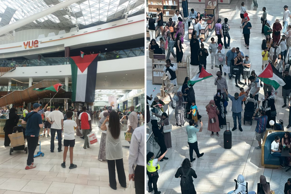 A large Palestine flag was dropped by activists in the middle of Westfield Shopping Centre in Shepherd's Bush, west London on Sunday, 28 July (credit: Ealing Friends of Palestine).