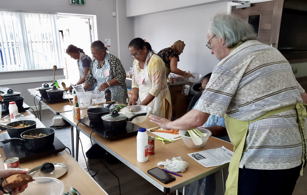 Peter using his kitchen skills to help other learners on the Multiply course. Photos: Leicestershire County Council