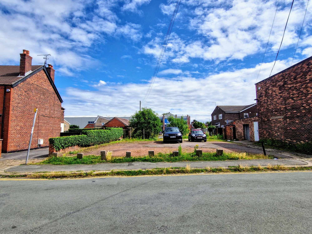 Plans have been submitted for a small apartment block on land used as an unofficial car park, close to Crewe's Grand Junction Retail Park (Ryan Parker).