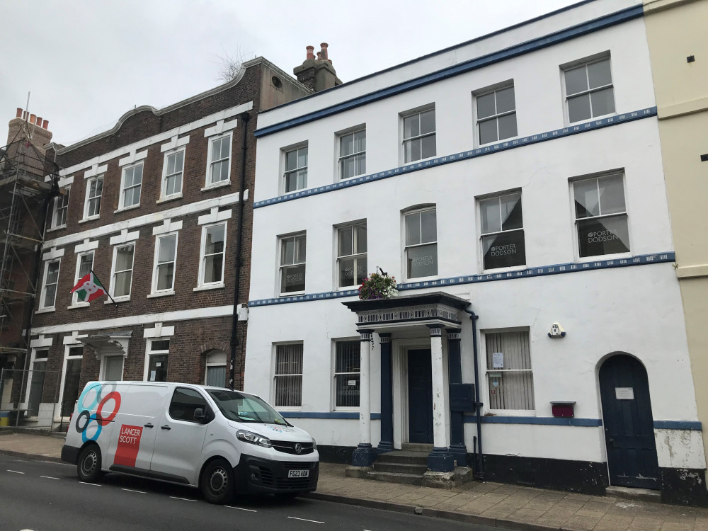 Former neighbouring solicitors offices in High West Street Dorchester, once grand town houses, now likely to be converted back to homes.