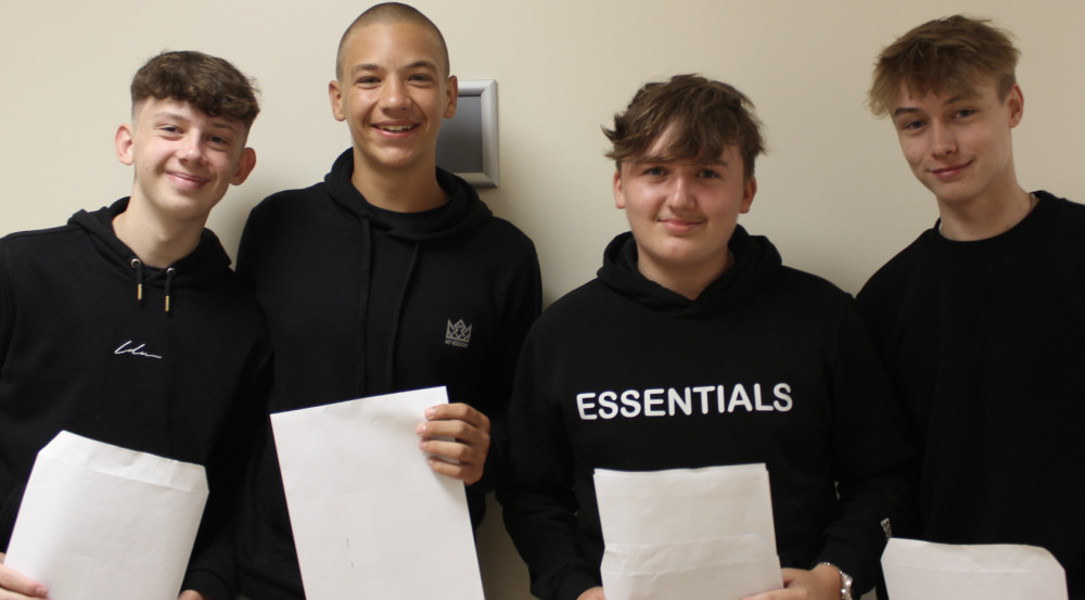 George Barr, Isaac Rozsas, Elliot Oldfield, and Caelan Ainscough look proud with their results. 