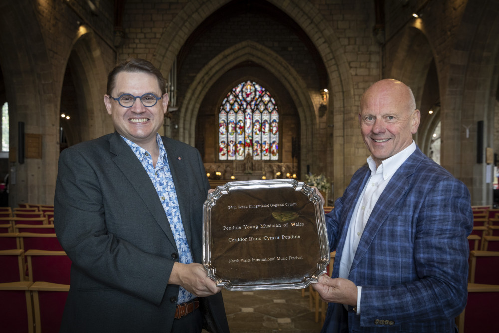 Paul Mealor, Artistic Director of the North Wales International Festival and Mario Kreft MBE, proprietor of Pendine Park, with the Pendine Young Musician of Wales Trophy.                