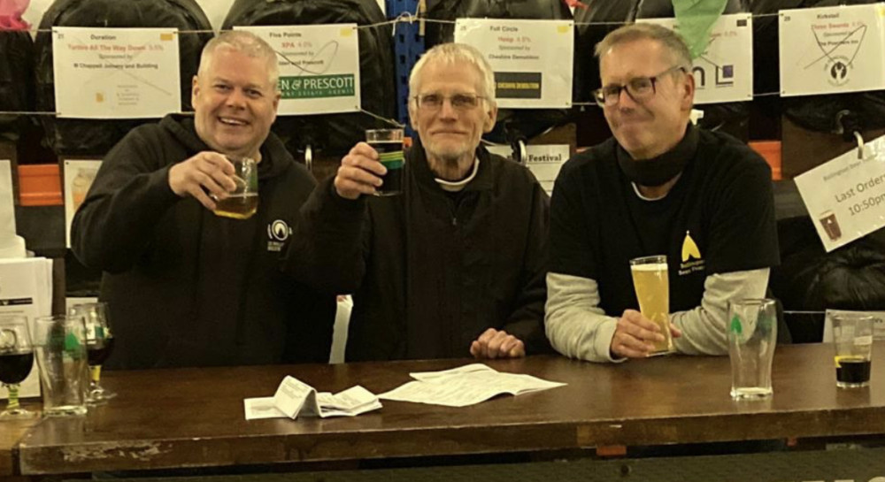 Lee Wainwright, Keith Farman and Phil Parry raise a glass at the end of Bollington Beer Festival 2024. 