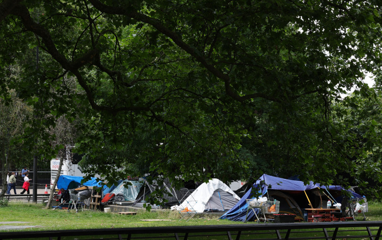 The encampment, which is on a patch of green space in Park Lane, is estimated to contain around 15 tents. 