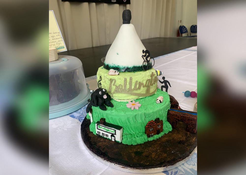  If you think you can make a more delicious looking cake than this White Nancy one, why not take part? The charity it benefits, can also be spotted on this yummy cake! (Image - The Bridgend Centre)