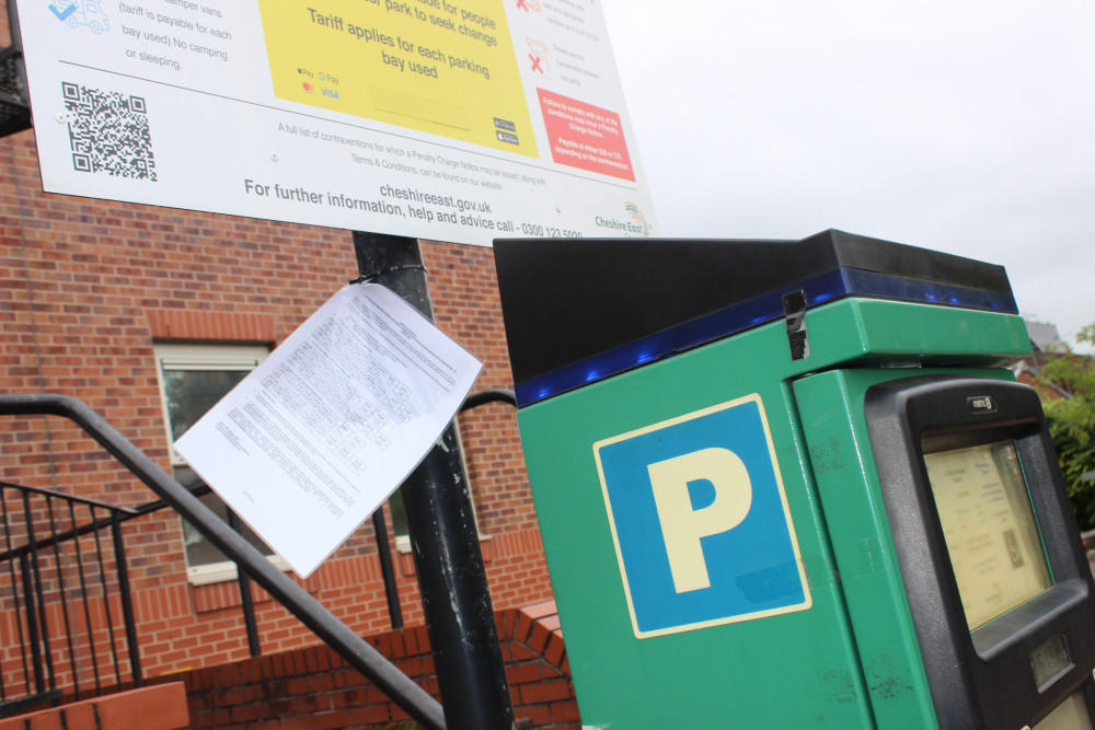 A notice of Cheshire East Council's proposed changes to parking charges waves in the wind at the Macclesfield Town Hall Car Park. (Image - Macclesfield Nub News) 