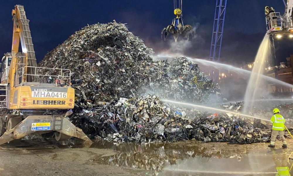 Firefighters worked alongside workers at the recycling plant to tackle the fire in stages