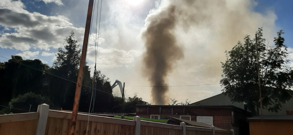 Smoke rising from the site which is close to residential homes. 