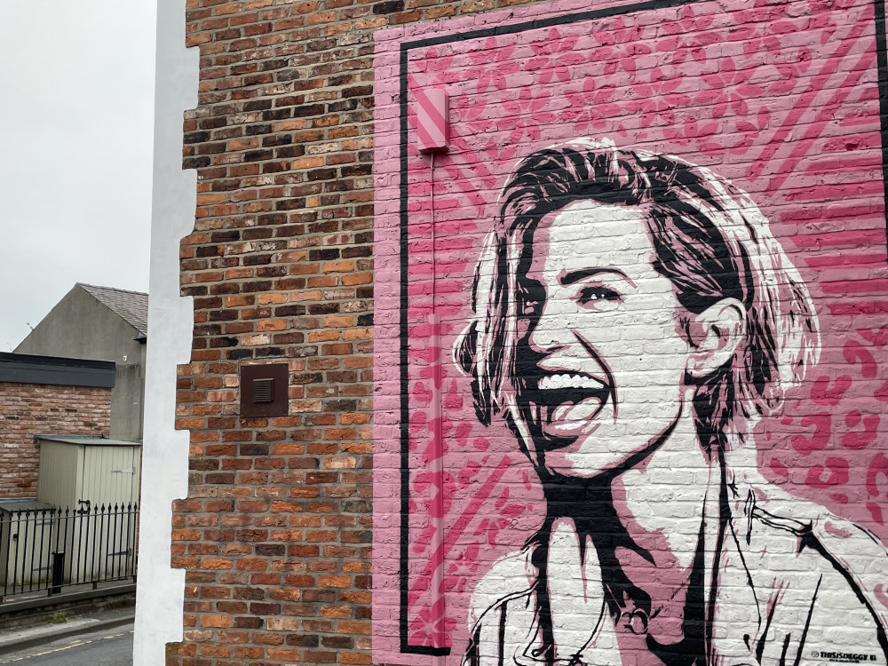 The plaque will be unveiled at the site of the Sarah Harding mural on High Street, painted by Deggy (Image - Alasdair Perry)