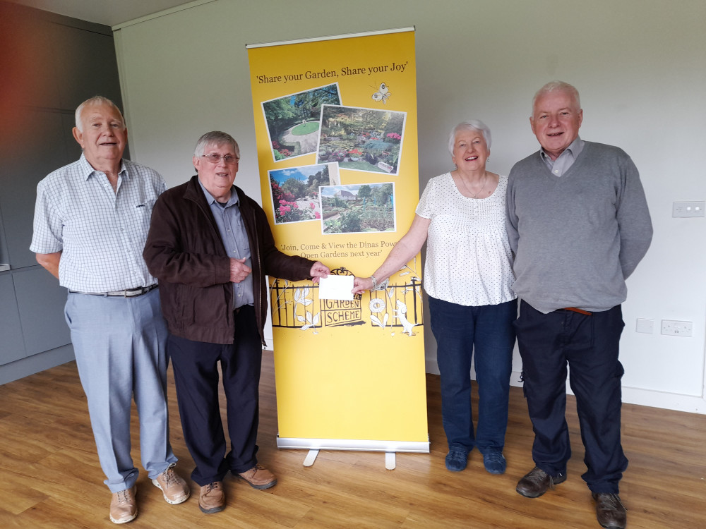 The Dinas Powys Voluntary Concern team Keith Hatton, John Fanshaw and Chris Franks with Ginny.