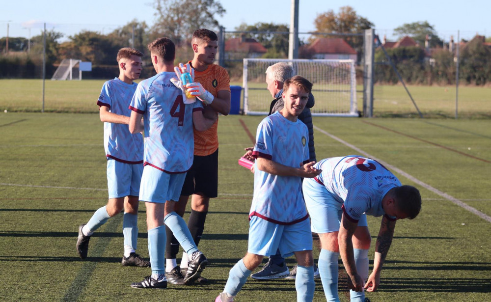 Rocks celebrated at the end of the match with congratulations offered by former East Thurrock boss John Coventry snr, who has returned to the coaching fold at the fledging club.  Pictures by Vic Evans.