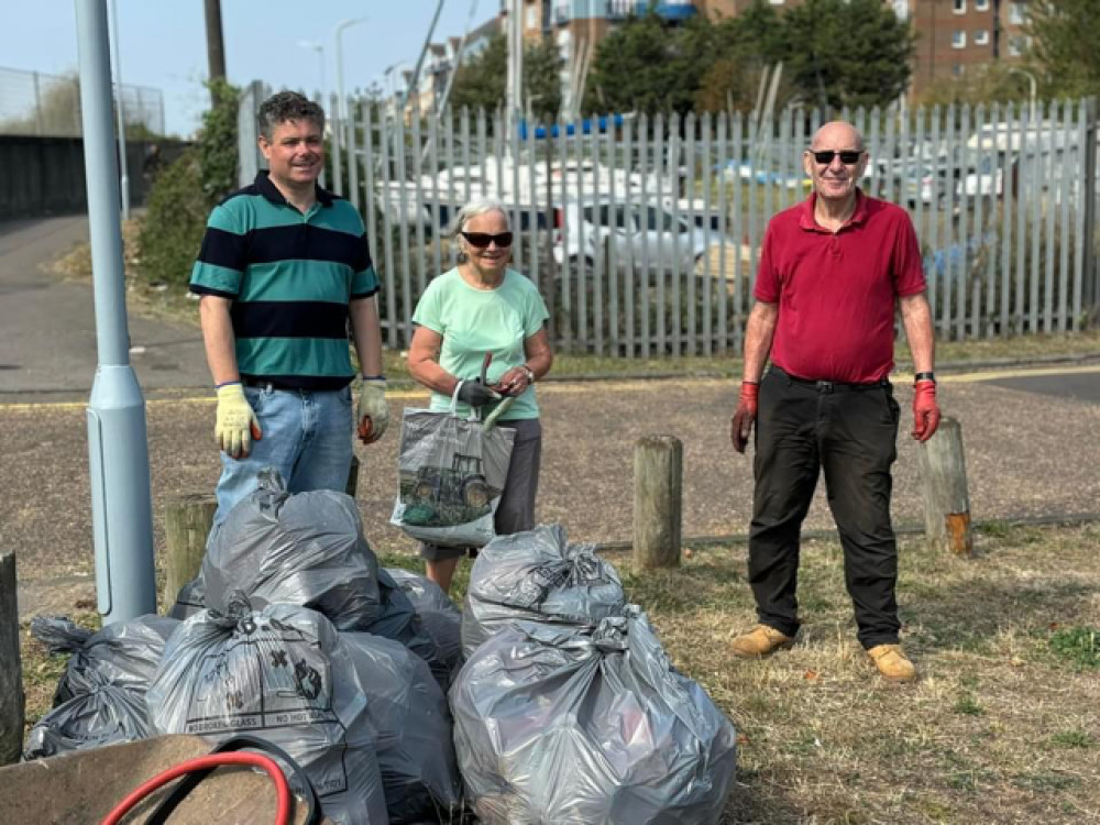 Steve Catchpole, right, with volunteers at a previous collection which gathered up many bags of rubbish and plastic waste.