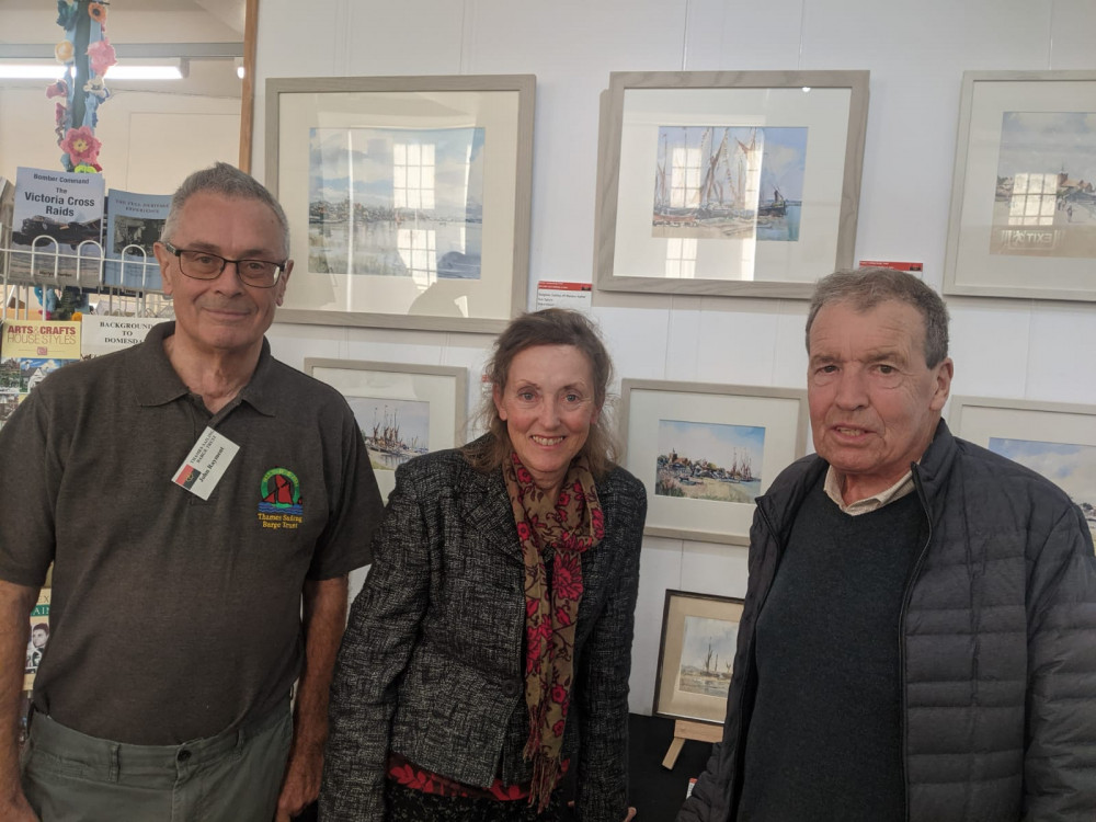 Artists Sue Spiers and John Green are pictured with John Rayment of the Thames Sailing Barge Trust, left, at the exhibition launch on Thursday (Oct 3).