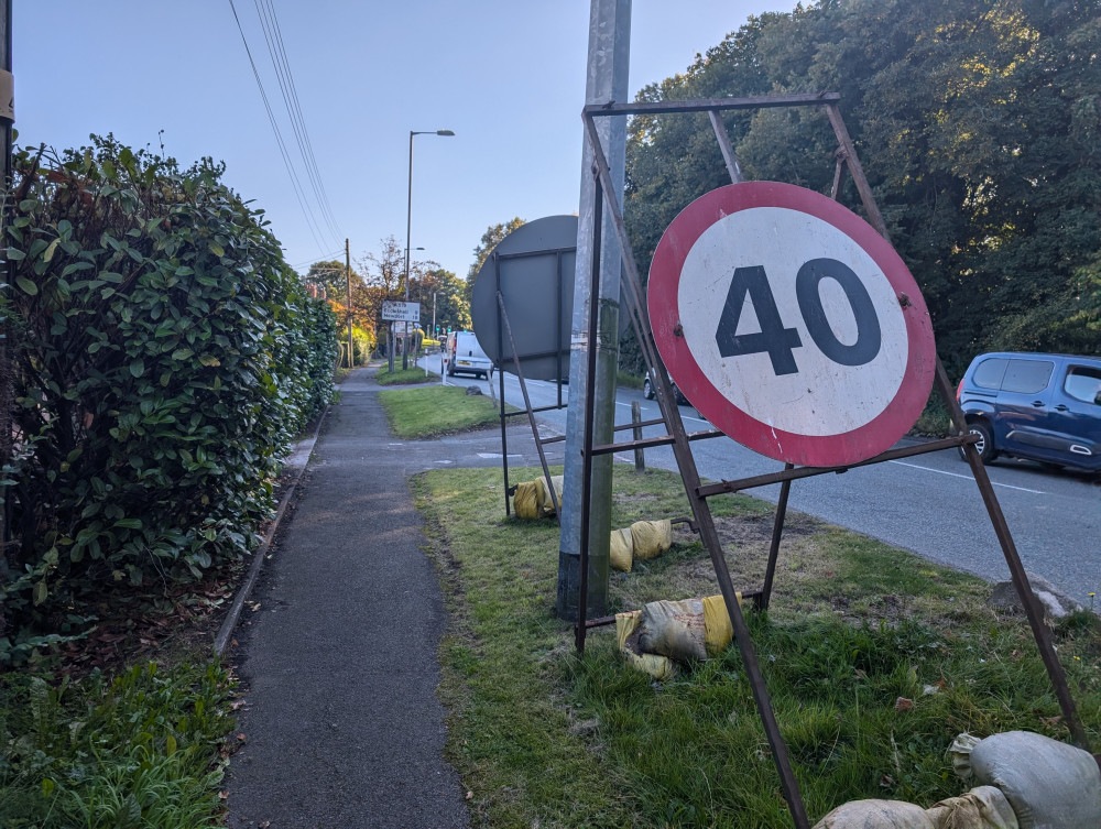 The temporary speed limit sign completely blocks residents view when trying to leave their home (LDRS).