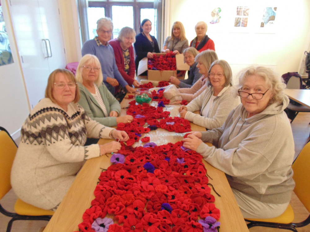 Members of the Yarn and Yarn group start making the 30ft display. (Photo: Stewart Green)