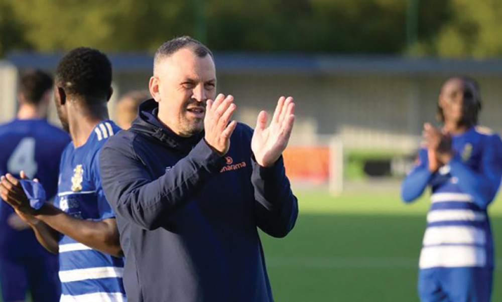 Manager Danny Scopes applauds the home supporters on Saturday.  Now he's just hoping for a bit of luck from footballing gods.