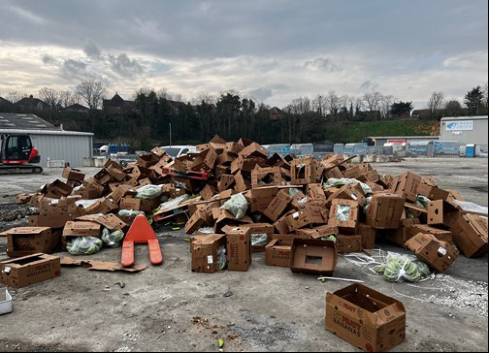 The banana boxes were left scattered at the site after being emptied from the lorry