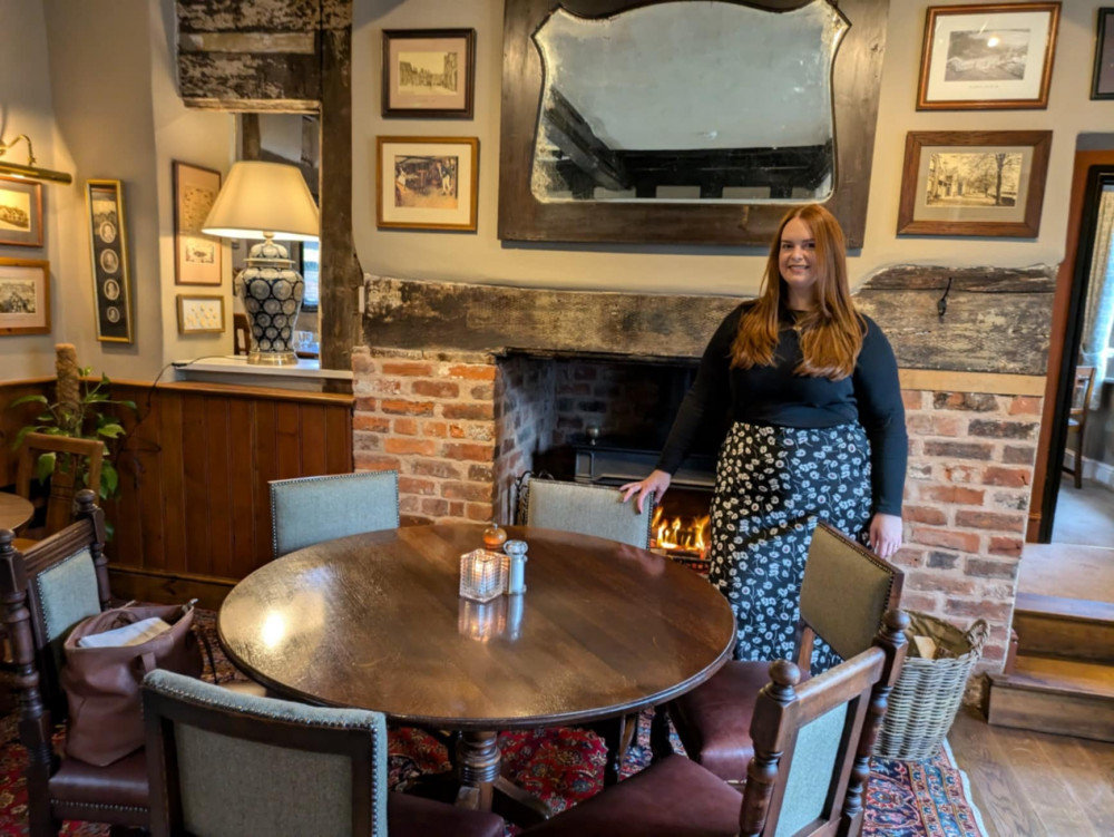 Manager, Hannah Wilkinson, standing in front of one of the open fires. (Photo: Nub News)